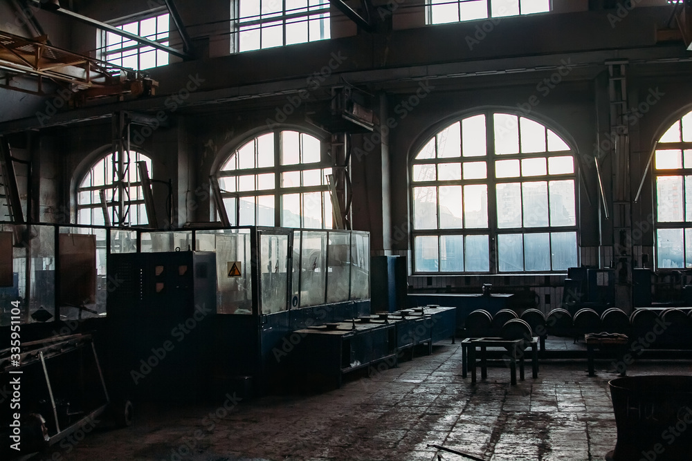 Old abandoned railroad workshop. Train repairing factory with old machinery