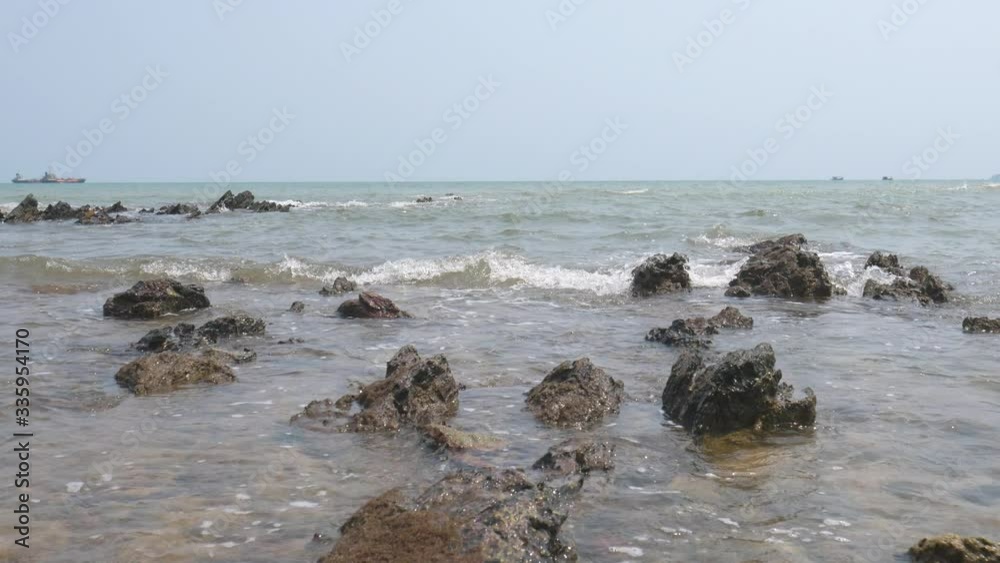 sea waves approached the coastline of the reef, nature sea background. sea waves approached the coastline of the reef, nature sea background.