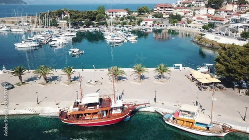 Port in a greek town Neos Marmaras. Aerial of the port located in a resort town Neos Marmaras with a plenty of boats and yachts. photo