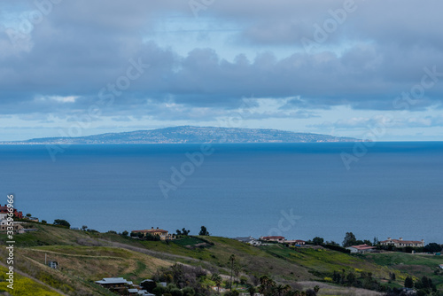 Scenic Malibu vista after a rainstorm, Southern California, with clear view of the Santa Monica Bay and Palos Verdes in the background