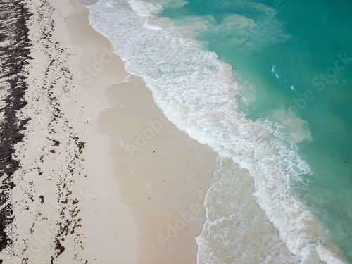 View from the bird-eye to the beautiful turquoise ocean and sandy beach, Caribbean sea, shot on a drone
