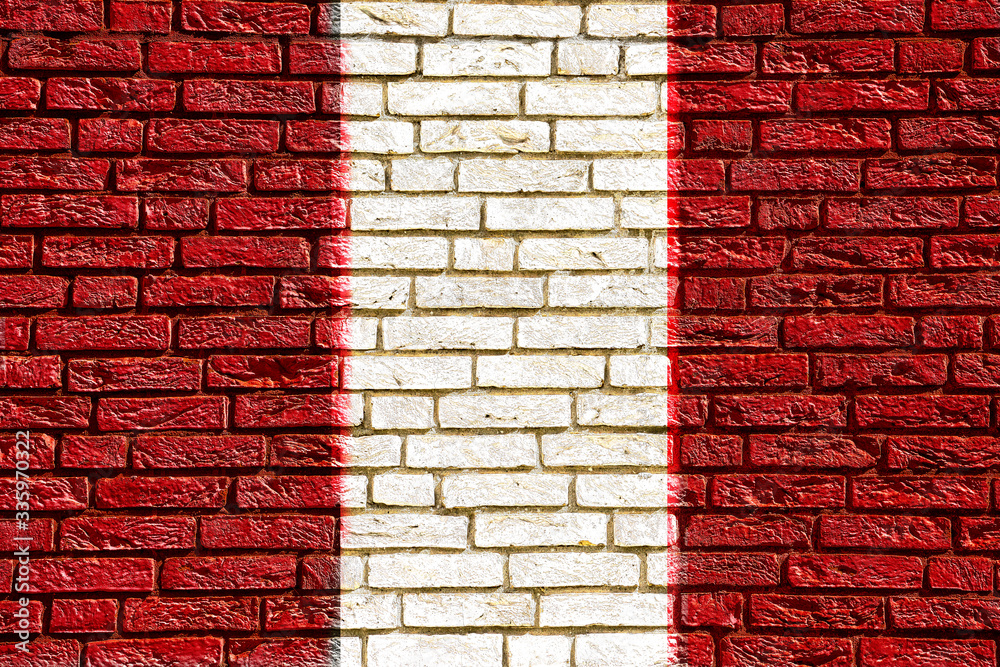 Colorful background and texture depiction of country flag on a brick wall. Colorful background and texture depiction of country flag on a brick wall.