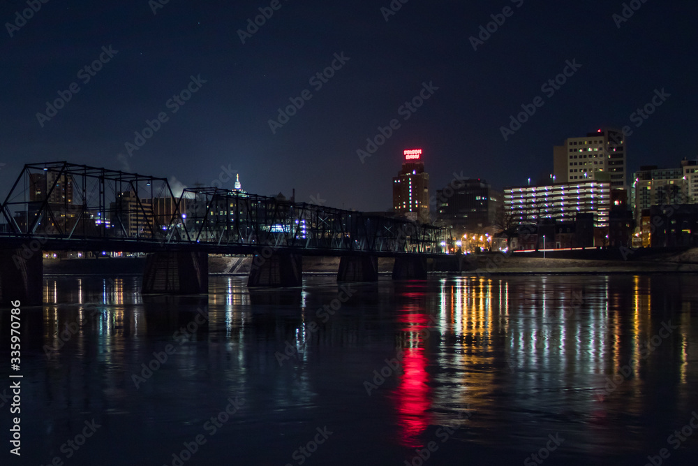 Night view of Harrisburg, PA across the Susquehanna River from City Island in winter
