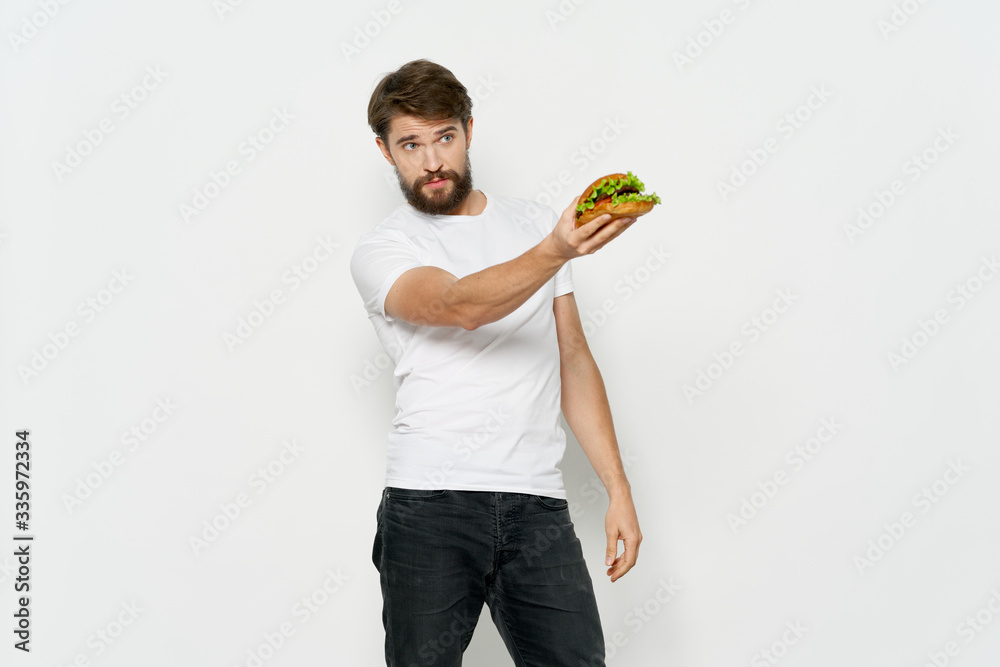 young man with a measuring tape young man with a measuring tape