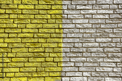 Colorful background and texture depiction of country flag on a brick wall.  photo