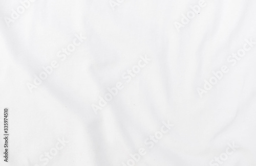 Abstract white fabric texture background. Wavy white cloth.