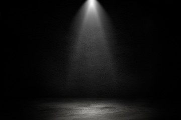 Empty space of Studio dark room black concrete wall and spotlight with concrete floor for showing product.