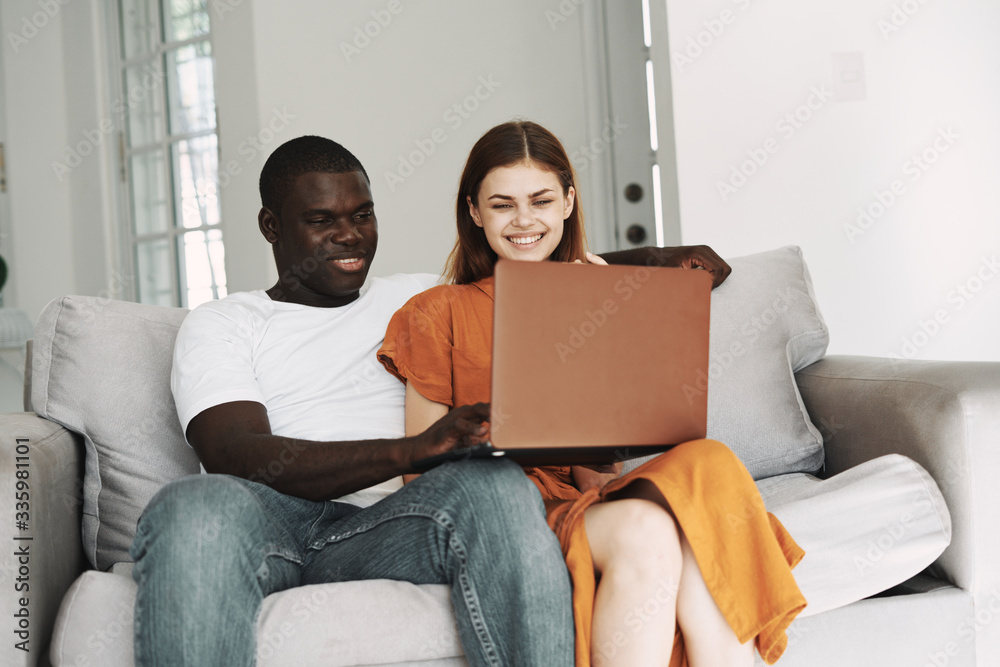 couple using laptop couple using laptop