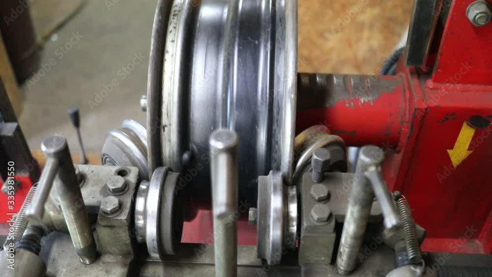 Process of tire repairing. Repair a tire from car by mechanic. Winter tires Process of tire repairing. Repair a tire from car by mechanic. Winter tires