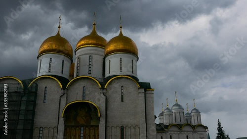 Left to right pan from Dormition Cathedral to Ivan the Great Bell Tower with a cloudy sky