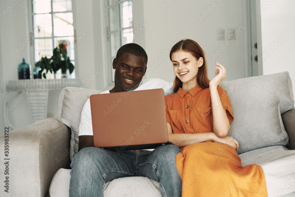 couple using laptop