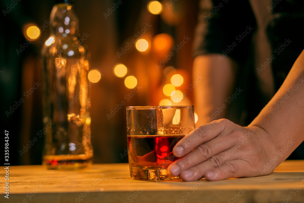 Barman pouring whiskey whiskey glass beautiful night
