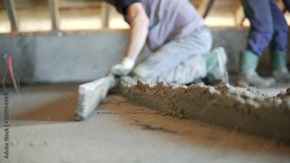 Plasterer Concrete Worker At Floor Smoothing Plasterer Concrete Worker At Floor Smoothing