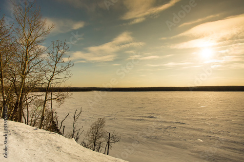 Fototapeta Naklejka Na Ścianę i Meble -  Sunset over Frozen Lake