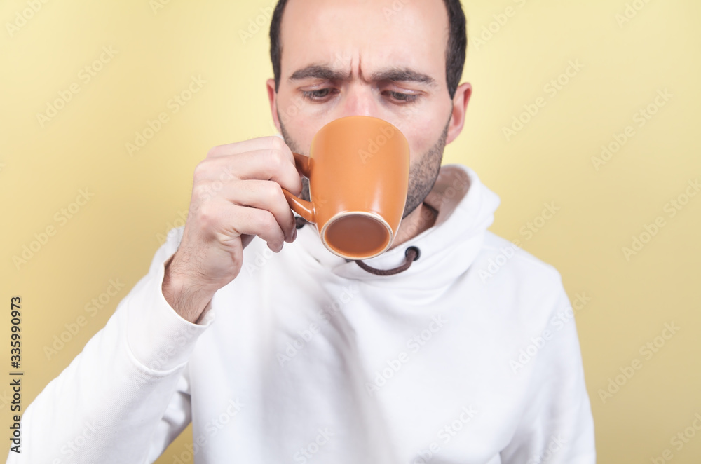 Caucasian man drinking tea at home. Caucasian man drinking tea at home.