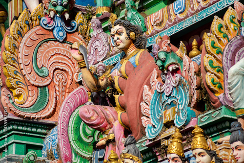 Hindu temple in Tamil Nadu, South India. Sculptures on Hindu temple gopura (tower), sculpture of an Indian deity