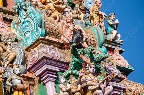 Hindu temple in Tamil Nadu, South India. Sculptures on Hindu temple gopura (tower), sculpture of an Indian deity