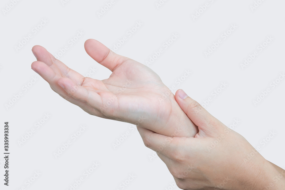 Closeup of wrist pain isolated background. Side view Closeup of wrist pain isolated background. Side view