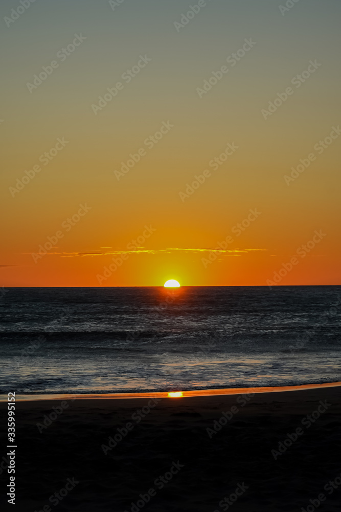 Beautiful view of a sunset in the beach of Naranjo Beach - Witch Rock- Costa Rica