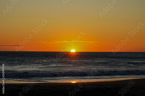 Beautiful view of a sunset in the beach of Naranjo Beach - Witch Rock- Costa Rica