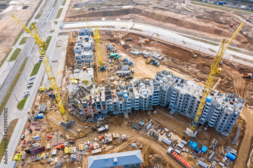 new modern multistory apartment buildings under construction. drone point view
