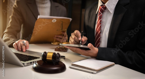 Canvas Print Businessman and Male lawyer or judge consult having team meeting with client, Law and Legal services concept in office