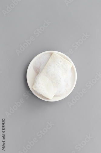 Soap bar - hygiene concept - on grey background top-down copy space