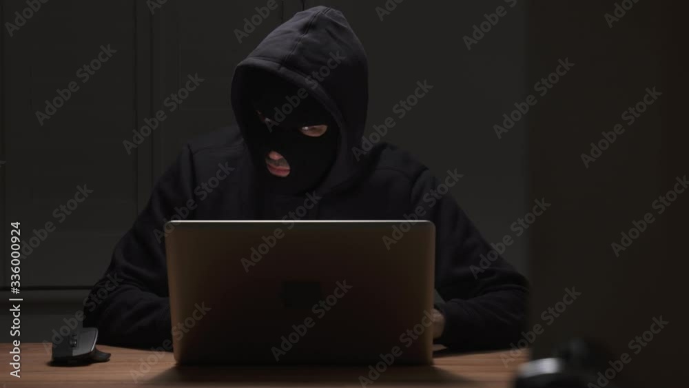 Cyber Crime, Hacker Man Typing On Laptop Computer. Cyber Terrorism Password Hacking. Dolly Shot.