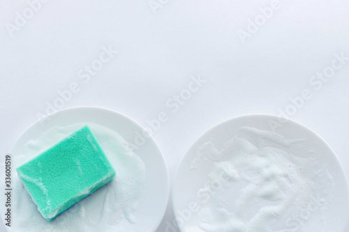 white foam plates against a white background