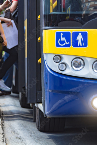 Public transportation / bus in urban surroundings on a station.