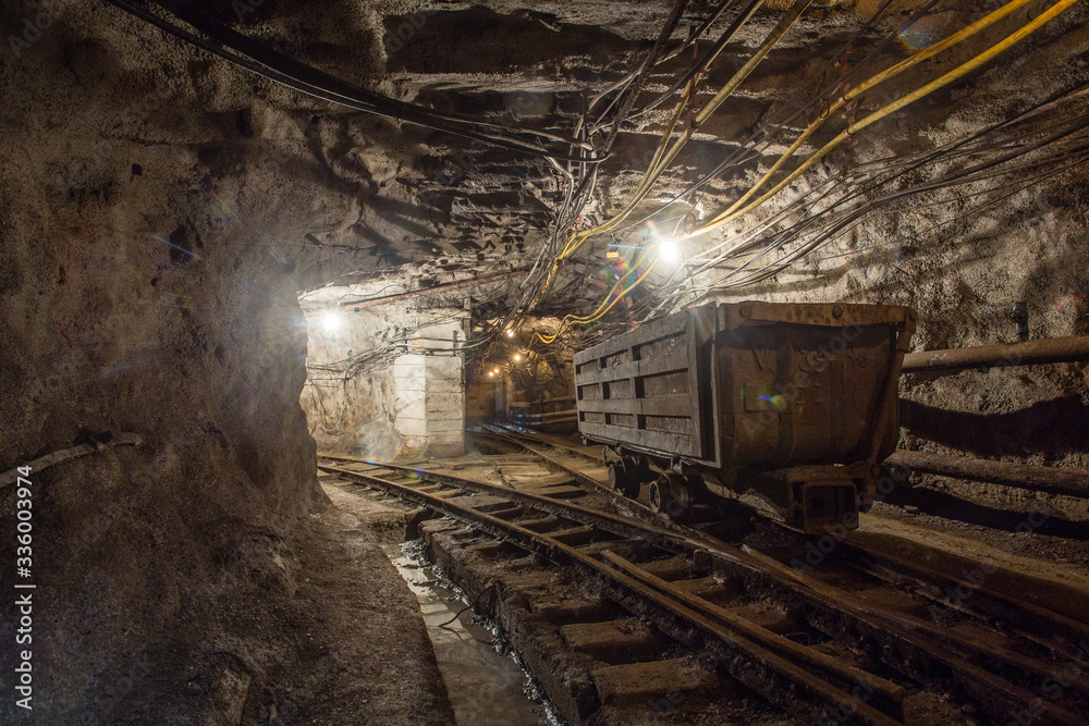 Naklejka premium Mining cart wagon in underground mine
