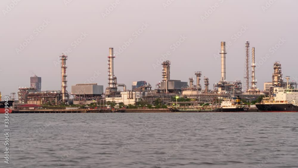 Time-lapse : View of oil refinery and storage tank at night Time-lapse : View of oil refinery and storage tank at night