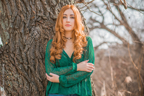 Boho modern style  redhead girl in lace vintage green blouse and skirt