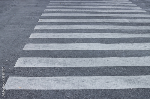Crosswalk on the asphalt road. Zebra crossing. Road Safety concept