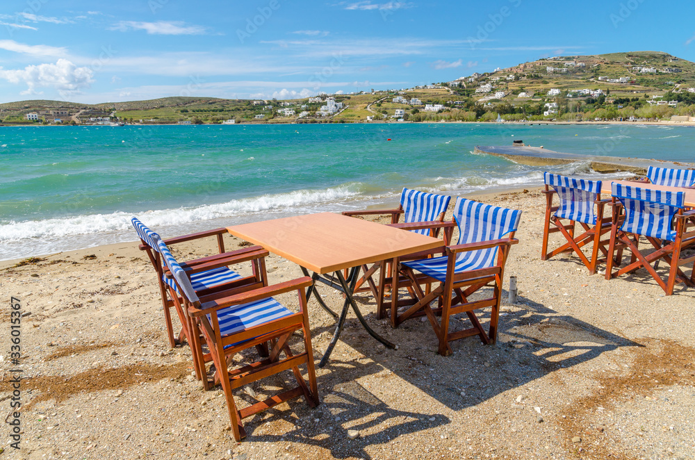 Romantic tavern on the sea coast in Paros island, Cyclades, Greece. Europe.