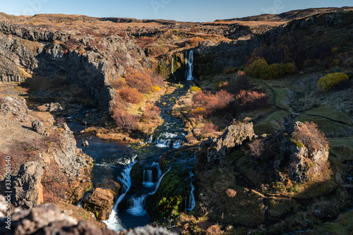 Gjain scenic valley with waterfalls and ponds in Iceland