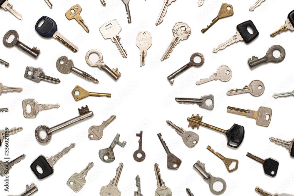 different door keys lie in a circle pointing towards the center on the white different door keys lie in a circle pointing towards the center on the white