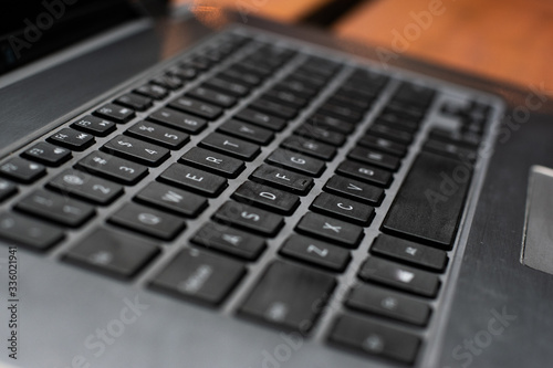 Close up macro of laptop keyboard and screen