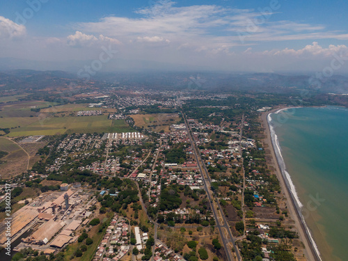 Beautiful aerial view of the city of Puntarenas and the Paseo de los turistas at the sunset in Costa Rica © Gian