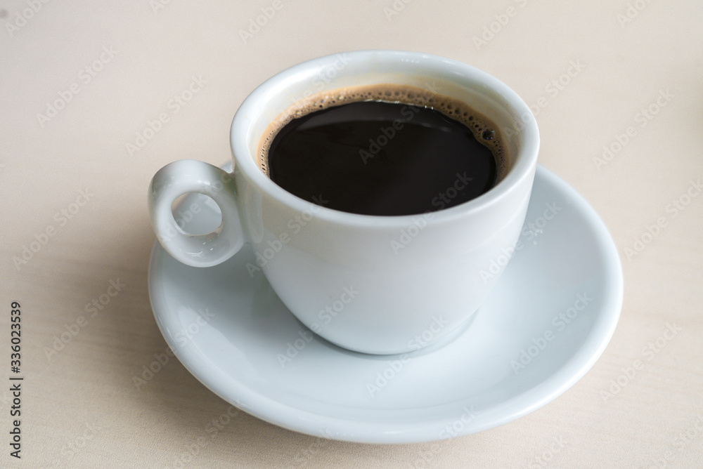 Black Coffee Cup on Table in Office