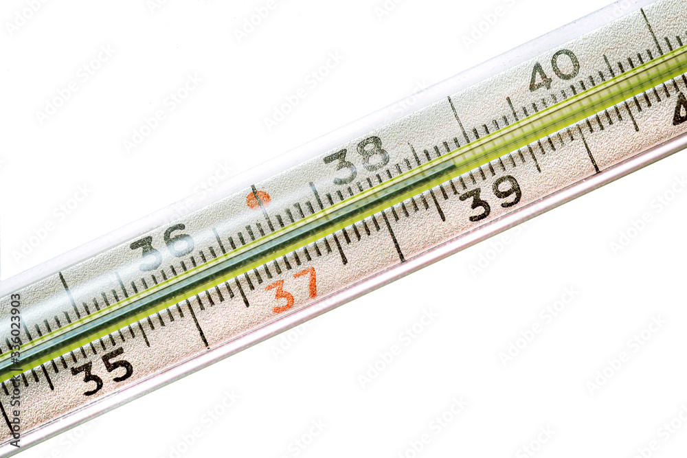 an old mercury thermometer showing a fever in close-up on a smooth background 38,8° an old mercury thermometer showing a fever in close-up on a smooth background 38,8°