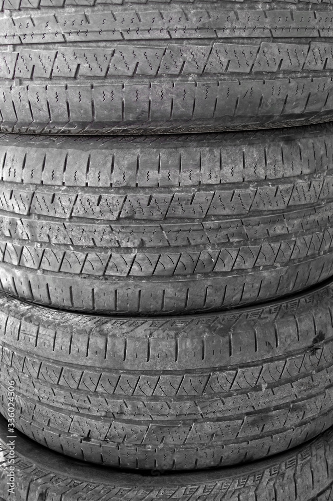 Obraz premium Pile of old tires on the ground