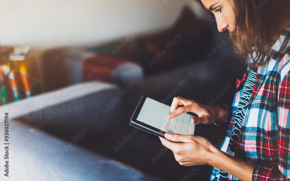 Hipster girl working tablet technology, workplace at home, isolation person holding computer with blank screen,  female hands texting mockup gadget, communication wifi internet - obrazy, fototapety, plakaty 