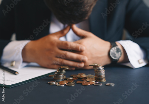 Depressed businessman lost his business. Destroyed businessman. Concept of business loss, bankruptcy and crisis.
