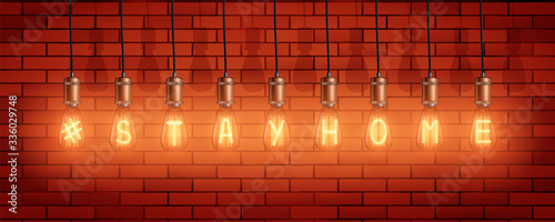 Light bulb with Stay Home symbol. Decorative Retro edison light bulbs with text stay home on brick wall background. The recommendation to stay home during quarantine. Vector Illustration