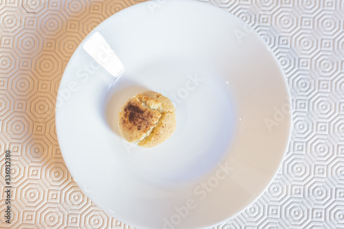 Small biscuit in a white plate.