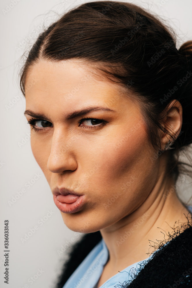 Naklejka premium girl shows tongue