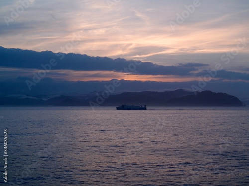 One car ferry sailing off the coast of Kii Peninsula in the morning glow photo