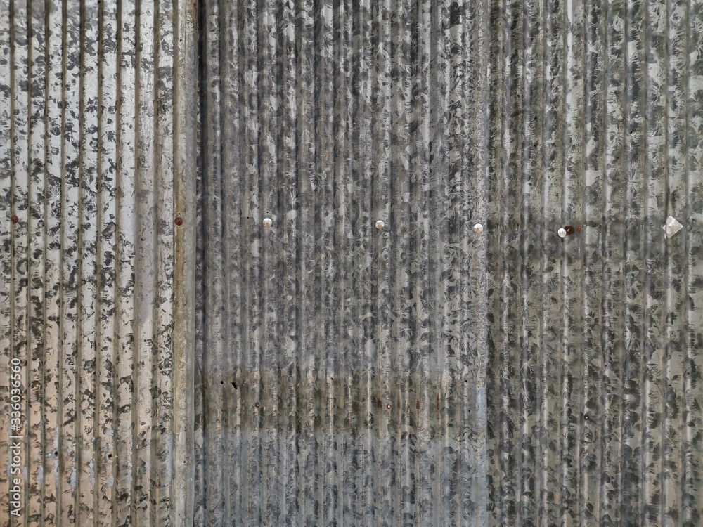 Fototapeta premium rusty metal wall background. old zinc roof texture. wall aluminium stainless