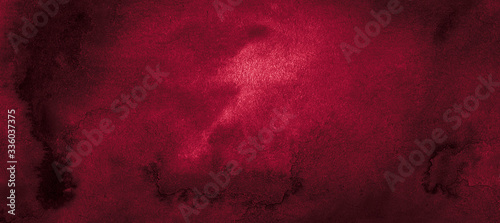 Dark saturated burgundy watercolor background with torn strokes and uneven spots. Trendy color texture. Abstract persian red background for design, layouts and patterns.
